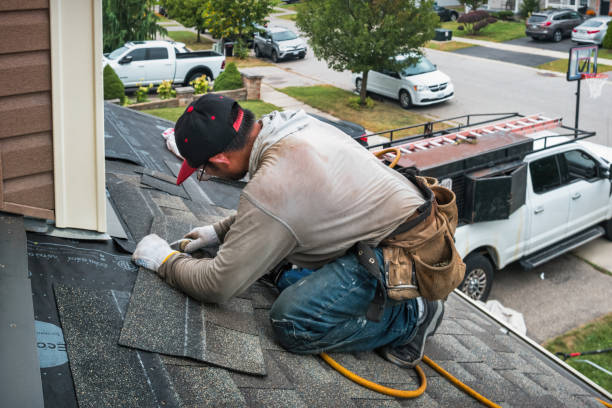 Professional Roofing technician working in Bushnell, IL